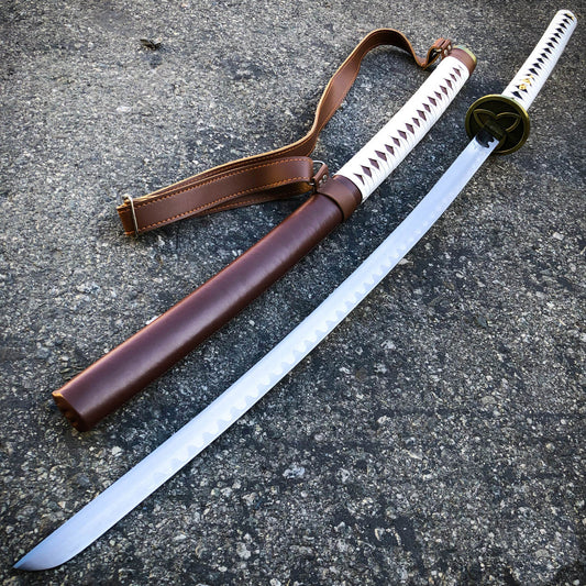 Michonne katana replica with white leather-wrapped handle and white scabbard